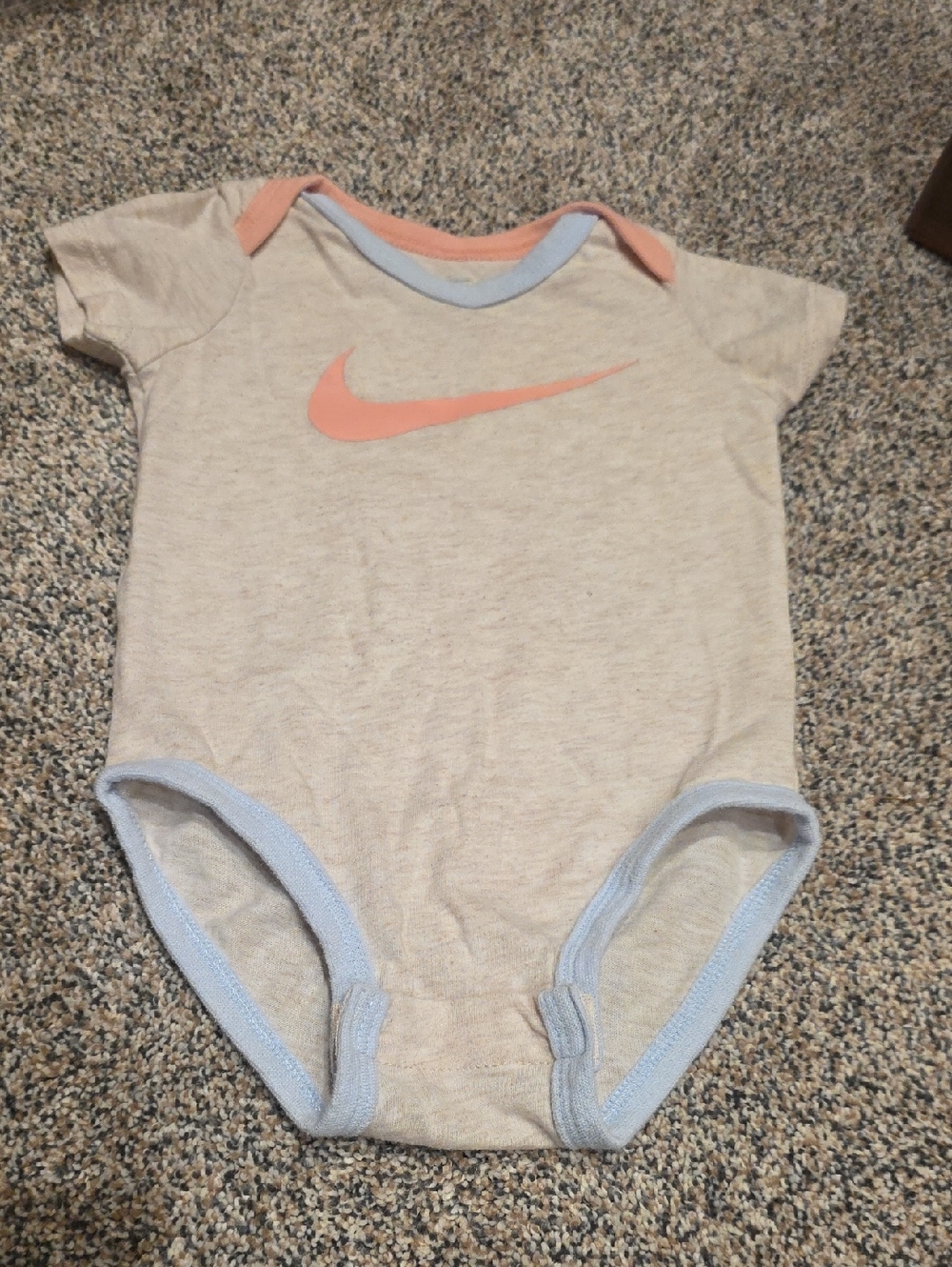 Nike Beige Baby Bodysuit with Pink Swoosh and Blue Trim
